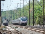 train 184 passing work train